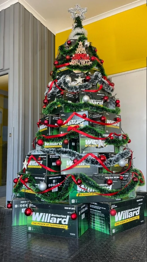 Christmas tree built from Willard car battery boxes in the Battery Fitment Centre workshop, Goodwood